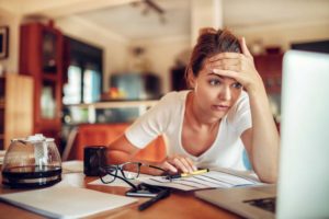 Woman showing signs of marketing stress and overwhelm